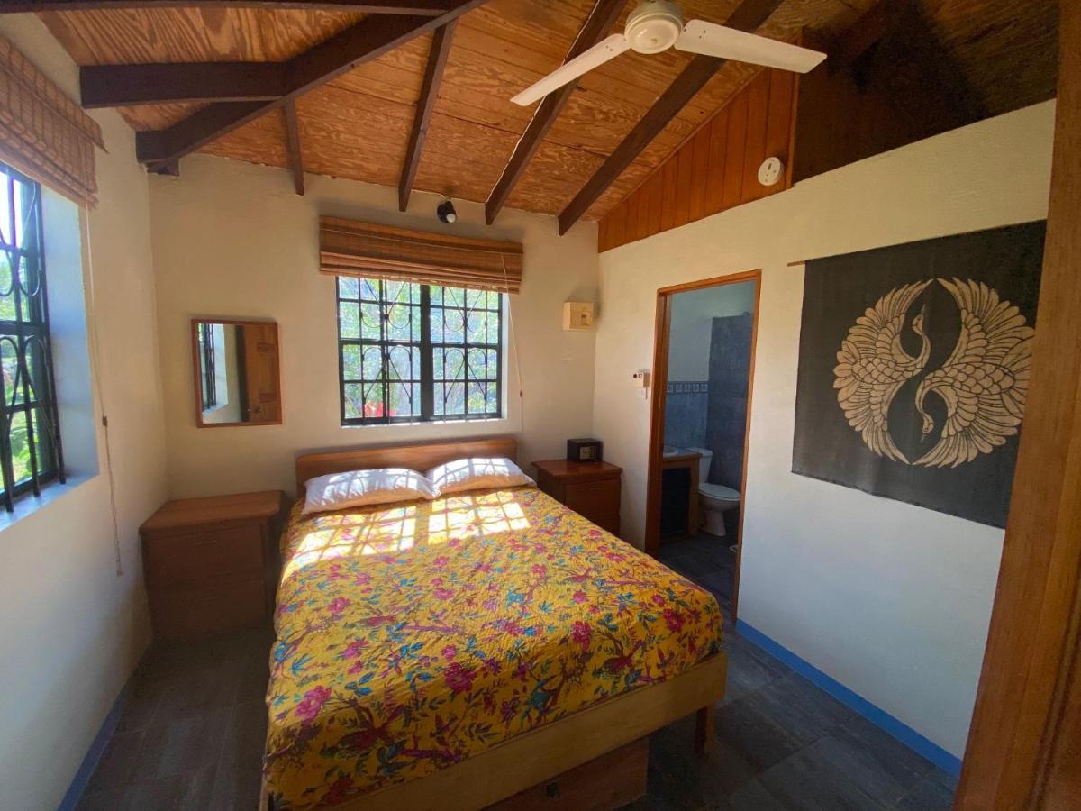 Sea Cliff Eco-Cottages & Gin Distillery Calibishie Extérieur photo
