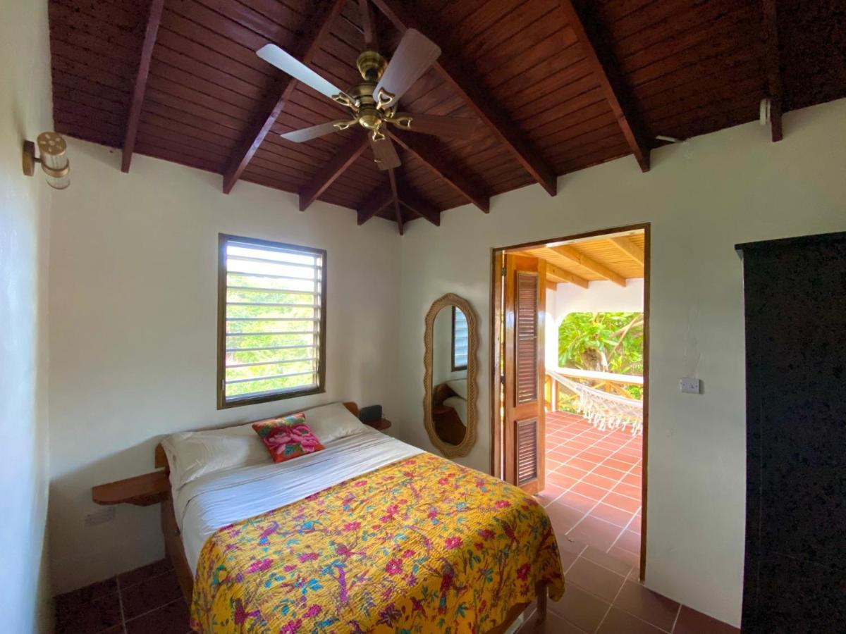 Sea Cliff Eco-Cottages & Gin Distillery Calibishie Extérieur photo