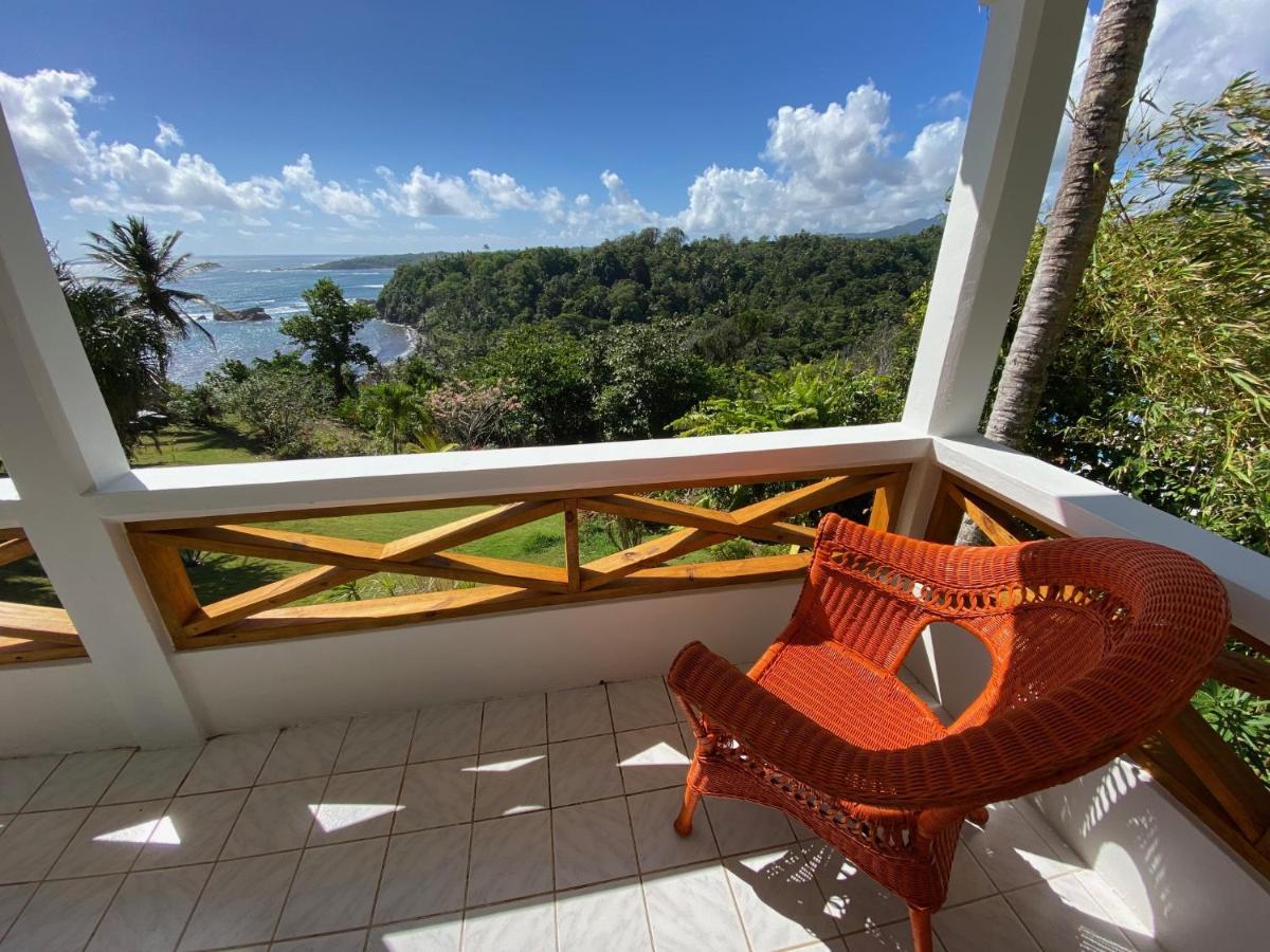 Sea Cliff Eco-Cottages & Gin Distillery Calibishie Extérieur photo