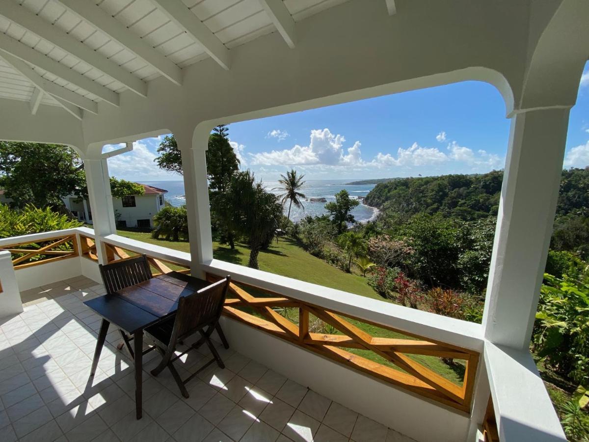 Sea Cliff Eco-Cottages & Gin Distillery Calibishie Extérieur photo