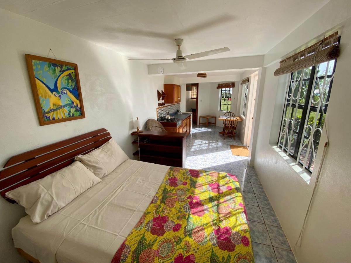Sea Cliff Eco-Cottages & Gin Distillery Calibishie Extérieur photo